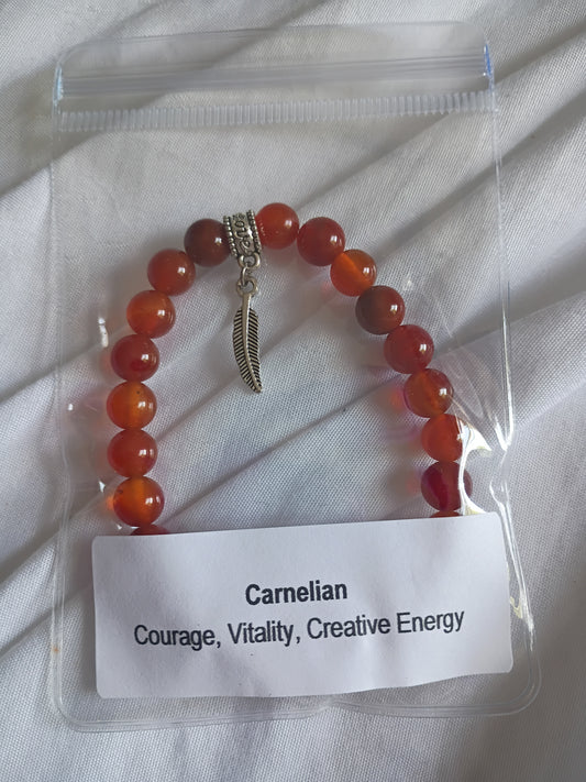 Carnelian energy bracelet with feather charm